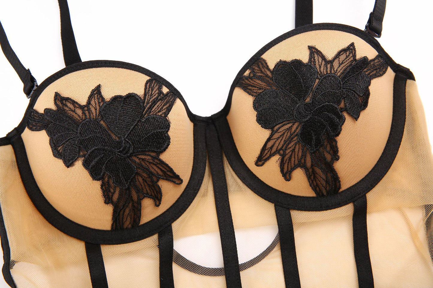 Body damskie z haftem kwiatowym i prześwitującą siateczką od Pernille – eleganckie body koronkowe w kolorze nude i czarnym, bielizna damska premium
