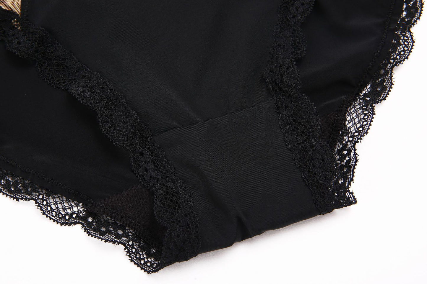 Body damskie z haftem kwiatowym i prześwitującą siateczką od Pernille – eleganckie body koronkowe w kolorze nude i czarnym, bielizna damska premium