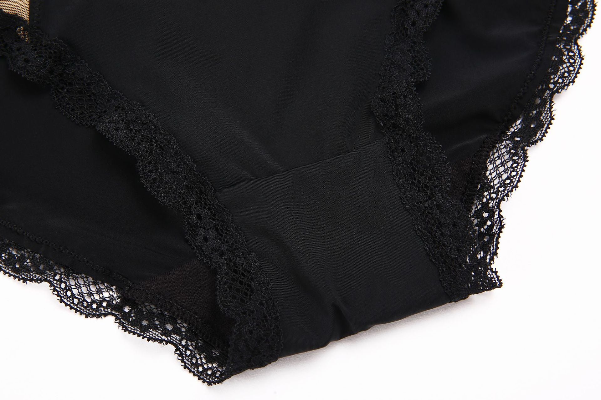 Body damskie z haftem kwiatowym i prześwitującą siateczką od Pernille – eleganckie body koronkowe w kolorze nude i czarnym, bielizna damska premium